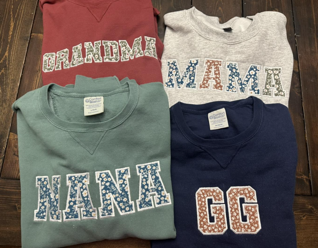 handmade sweatshirts by Keleher Krafts featuring outfits that daughters wore when they were a baby makes such a sentimental gift for mothers day